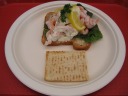 Lunch: an apparently Norwegian open-faced shrimp sandwich (sm�rbr�d),
accompanied by lefse, a thin, sweet, folded bread.
