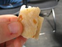 Another lefse.  Lefse are made from some sort of flour and, usually,
brown sugar and butter.  This lefse was made from potato flour and
topped with cinnamon and sugar.  As the cook said, there are lots of
other possible toppings (e.g., cardamom, almond, vanilla) for lefse or
lefse could be used to wrap around other things.  One could even wrap a
lefse around a hot dog, thereby making a dish called a polse, though in
this context one uses lompe, which is slightly different from lefse.  The lefse I had with lunch was made with wheat flour; I think I
preferred that one.
