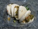 "Taiwanese pancake."  The buns were like the type used in Peking duck. 
The filling was chopped vegetables similar to those one finds in mu shu.

