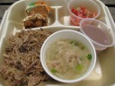 My Hawaiian lunch plate:
 kalua pork: decent, moist.
 chicken with thin, translucent vermicelli noodles (warm): pleasing.
 poi (the purple thing) (mashed taro): a starchy pudding that I 
really didn't like.
 lomi lomi salmon (salad of diced tomatoes and raw salmon): I liked 
it.
 carrot cake.

