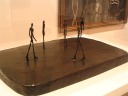 A small sculpture of tall thin figures walking.  Reminds me of

a similar piece I saw in Calgary
and vaguely of 
some statues I saw earlier this week in Princeton.
