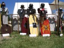 A display of the armors worn by militaries at different times.  View full-sized
to read the placards labeling each outfit.
