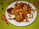 Classic poutine again, photographed with a flash.

