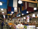 The one photograph I took inside the market before being told photographs 
were not allowed (!).  Look at all the flags.
