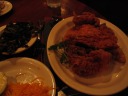 Fried chicken (right) and collard greens (left).
