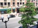 A panoramic video of the view from our window seats in Harry's Tap 
Room. If you look closely, you can see that the second and third 
floors of the building directly across are actually a garage. (One can 
see cars through the pane-less windows.) This is a smart way to hide 
the traditional ugly bulk of a parking structure.
