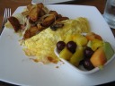 Omelette, potatoes and onions, and fruit.  The omelette could've been 
more filled.
