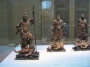 Some fairly gruesome Japanese sculpture of victorious warriors with
defeated demons.  They are said to symbolize "dominance over any enemies
of Buddhism."
