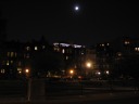 Bay Back has strip of a park through it.  I particularly like this
picture due to the contrast between the dark buildings and the glow from
the fifth story rooftop and the full moon.

