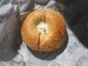 Sesame bagel with lite scallion cream cheese.  I was surprised when
asked if I wanted it toasted.  In New York, New Jersey, and other places
in the northeast, when I specifically ask for a bagel toasted, I get
funny looks and often the response, "We don't do that." Here, it was
offered without even being requested!  Incidentally, I said no.  I
wasn't in the mood.


