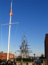 The USS Constitution's masts, as seen from a distance.
