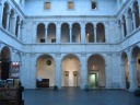 The museum's interior courtyard.  The eaves in the courtyard "create the
illusion of a roof and open-air court ... heightened by third-floor
casement windows."

