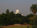 The onion-shaped dome of a distant mosque.
