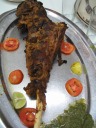 Tandoori roan.  A whole thigh, with spicy, soft meat.
