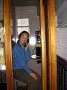 Di Yin in a real, working phone booth in the building's stairway/entrance.
