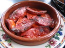"Chorizo a la Plancha - Grilled Spanish Sausage."  Classic.  Traditional, 
interesting grilled spicy chorizo.  Good, of course.
