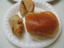 From the Chinese station:


bbq pork bun - good quality, especially the bun, which was lighter
than usual.  If only the bun weren't greasy to the touch, I'd call the
dish perfect.

egg roll - nicely greasy on the inside
fortune cookie

