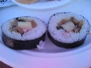 From the Japanese table, two futomaki rolls.  (They also had cucumber
rolls and California rolls, but I didn't want either of those.)
