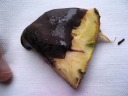 Chocolate-dipped pineapple.

