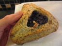 Poppy seed hamantaschen.  It was cake-y and big, with the filling only in
the center.  I'd describe the filling as "nut butter" or an earthy cross
between seeds and nuts.
