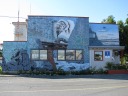 Somehow, the mural's background makes the building look run-down.  (It's not.)
