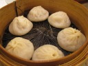 The top-notch xiao long bao (Shanghai soup-filled dumplings) had tons of
soup in a very delicate wrapper.  We found them easiest to pick up by
their tops.
