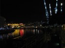 Clark Quay and Riverside Point at night.  At right is a large "reverse bungee."
