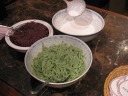 The raw ingredients for my cendol dessert.  The waitress brought me over
to the counter to show me as she made it.  This was a basic version with
only five ingredients: green bean flour, red beans, coconut milk, ice,
and palm sugar.

