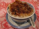 My satisfying cendol.  (The beans and noodles are at the bottom.)  I was
a little scared taking my chance on the ice--I didn't know where it came
from and the water in Malaysia isn't always safe to drink--but
apparently it was fine.
