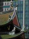 A close-up of some of the many decorative dragons/serpents on the roof. Excellent.
