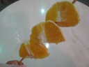 My snack of oranges, skewered.
