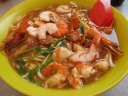 Prawn mee.  Although it's a hot soup, despite the hot weather, I liked
it.  I think it came with a chili-soy dipping sauce that I was indifferent
between adding versus not.
