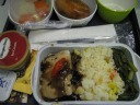 "Fried rice with fish" (fine), assorted fruit, buttery bread with a hard
center (which I ate around), and, most importantly, ice cream. :)
