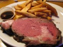 A good prime rib--the caliber of P.J. Skidoos, my Virginia-located
benchmark--and good steak fries.

Doesn't the dish look tasty?  It was. :)
