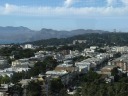 Rows of San Francisco town houses, with the Golden Gate Bridge and Marin
in the distance.

It's worth viewing the full-sized image.
