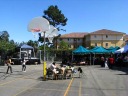 A panoramic movie showing the festival site.  The festival was held
mostly in a church's parking lot, complete with basketball hoops. 
(Technically the festival extended inside the church as well, but there
wasn't really any stuff indoors.)  Near the end of the movie, keep an
eye out for the grooving bartender.   If you watch the movie with
sound, you can hear the music that played most of the time I was at the
festival.  (I didn't stay for many of the live musical groups.)

