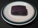 A purple yam for dessert.  Good.  It had a chewy texture like sticky
rice and a nice yam flavor.  The label says:

STM & JMJ Bake Shop
A Little taste of HEAVEN!
Blessed by Abouna Labib
Baked by Queen Victoria
I guess I like Filipino desserts.
