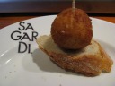 Croquette of bacall� (salt cod).  Mushy, whipped, fishy interior.

