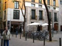 I had lunch at a pintxos joint: Sagardi.  Although it seems like the
restaurant's is only on the left, the bar runs the length of the
pictured building (and the other doors work).
