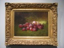 Cadurcis Plantagenet Ream's Purple Plums perfectly captures the
dewy glow fresh plums have, though the lack of reference 
points for scale within the painting makes them look huge.

Incidentally, the lighting makes the frame look pretty good too.
