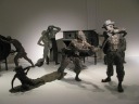 The "rent collection" courtyard contains many copper statues in 
emotional poses.  This is one of the two rooms of statues.

