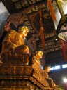 Buddhas in the Great Treasure Hall.  Those are intricately carved 
thrones.


