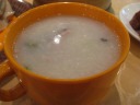Congee with sliced pork and veggies: good.

