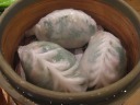 Steamed dumplings filled with pork, a green vegetable, and crisp water 
chestnut.

