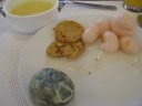 My breakfast: egg corn soup (labeled as "local cuisine"), lychee, a tofu 
something, a watercress dumpling, and a chocolate croissant (not 
pictured) (which tasted less wrong than I expected for China).

