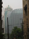 A funky building made of lots of glass.

