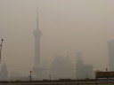 Pudong, the area across the river from The Bund, as seen in the distance 
through the haze.

