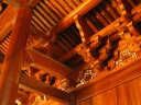 Inside the main building.  The wood has a nice glow.  I love how 
these buildings were built with no nails.  (Actually, I don't know if 
this building was constructed in that manner, but most Buddhist temples 
are, so I imagine this one was too.)

