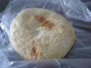 A plain (non-salty), thin sesame roll.  I liked how it was a tad sweet. 
 I also ate some fruit.
