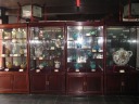 In the Teapot Museum in the temple complex, a picture to show a sample 
of the variety of styles, colors, and sizes of teapots on display.  That 
one on the right is large!

